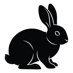 Silhouetted black rabbit sitting alertly its ears pointed upward a simple and iconic animal representation ideal for design silhouette