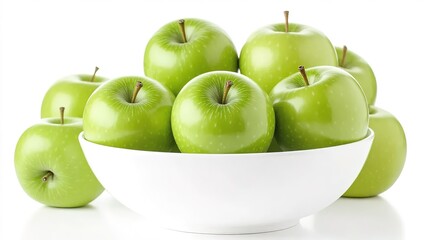 Fresh green Granny Smith apples in a white bowl.