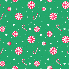 Cute colorful Christmas seamless pattern with red and white lollipop, candy canes, hearts and dots isolated on green background.Merry Xmas vector graphic illustration wallpaper.