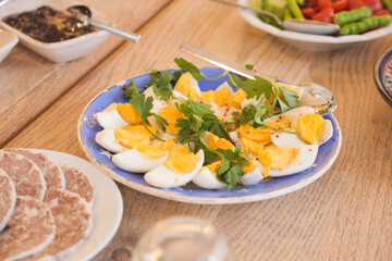 Freshly prepared egg salad on a dining table