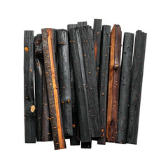 Stack of charred wood pieces, varying in color from black to amber, on black background