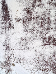 Vertical abstract wall texture with peeling white and brown paint, vintage rustic background for grunge and creative projects.