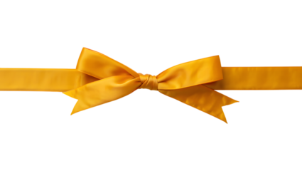 A bright golden yellow ribbon tied into a perfect bow against a stark black background