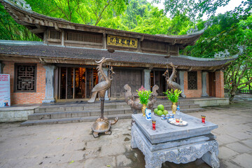 Temple at the Trang An Scenic Landscape Complex, Ninh Binh, Vietnam. Tam Coc National Park Sightseeing tour to grottoes.