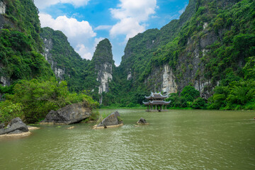 UNESCO World Heritage Site with spectacular limestone karst and grottoes scenery in Tam Coc National Park, Trang An, Vietnam 