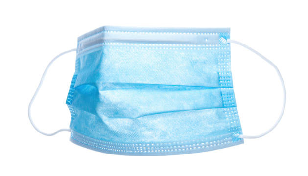 Close-up of a pleated, light blue medical mask, with ear loops, isolated on black