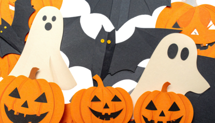 A festive Halloween scene with pumpkins, bats, and ghosts against a dark backdrop