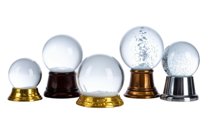 Five clear glass spheres with snow and stands, arranged on a black background