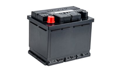 A close-up view of a black rectangular automotive battery with red terminal