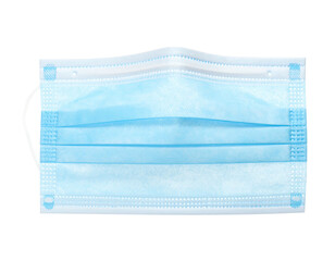 A light blue, rectangular, pleated medical mask, ear loops, isolated on black