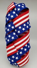 Patriotic Ribbon Roll with Stars and Stripes Design.