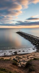 Coastal Serenity - A Stone Pier at Sunsets Embrace.