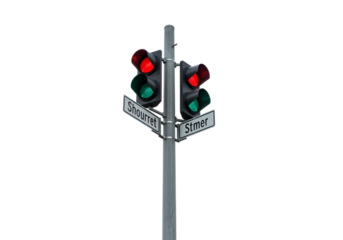 Urban Traffic Signal Pole with Red and Green Lights on Black Background