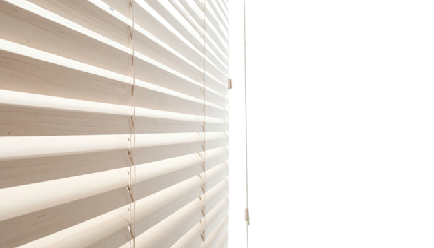 Close-up of light filtering through horizontal wooden blinds, casting shadows