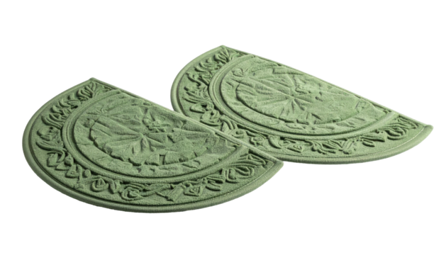 Two matching semi-circular, patterned objects in a pale green hue, isolated