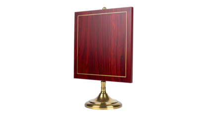 Richly-grained wooden plaque with gold trim, mounted on a brass pedestal