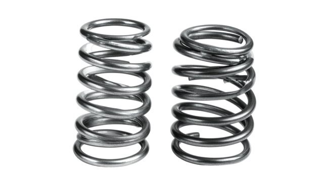 Two coiled metal springs, side-by-side, with a dark background, ready for use