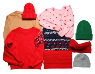 Assortment of folded knitwear sweaters, hats, a scarf, and a cardigan, isolated