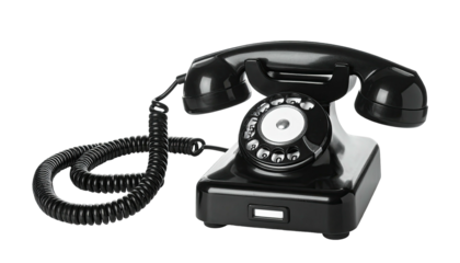 Glossy black vintage rotary phone with coiled handset against a black background