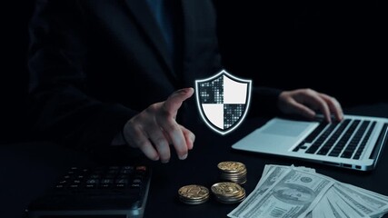 A concept depicting digital security with a shield symbol, showcasing the importance of cybersecurity in financial environments alongside money and a laptop. Qubit - Powered by Adobe