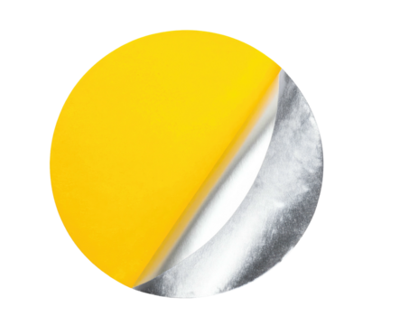 Yellow circular paper with corner peeled back to reveal metallic silver foil