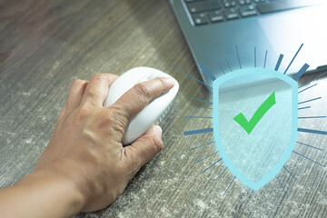 Hand Clicking Mouse with Digital Security Shield and Check Mark Overlay