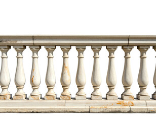 A classic balustrade of carved white pillars, on a low base, against black