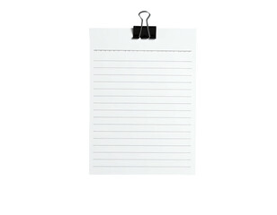 Blank lined paper, held by a black clip, against a dark background