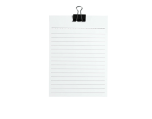 Blank lined paper, held by a black clip, against a dark background