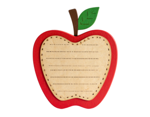 Wooden apple-shaped frame with lined paper, stem, and leaf. Isolated on black