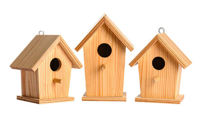 Three wooden birdhouses with various shapes against a transparent backdrop