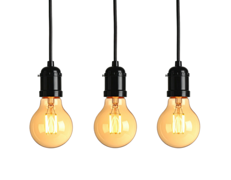 Three vintage light bulbs hanging against a black background, lit up and glowing