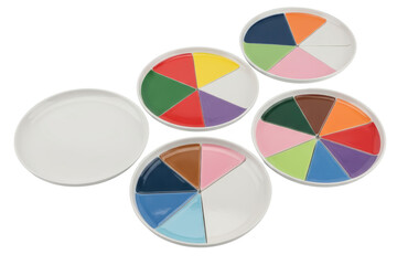 White ceramic divided appetizer plates with colored sections isolated on a transparent background