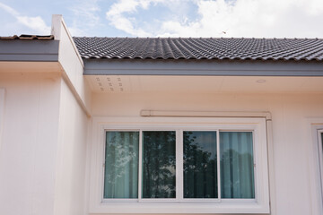 Modern architectural design of a residential home exterior view urban setting natural light contemporary style