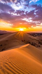 Dramatic sunset over sand dunes