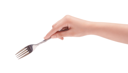 Female hand holding a shiny silver fork, isolated