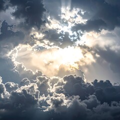 Dramatic sky with sun breaking through clouds