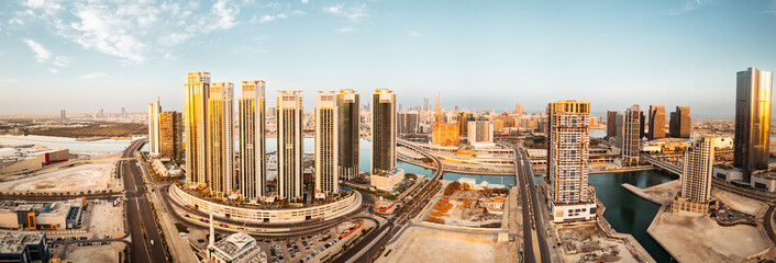 Abu Dhabi, UAE - 25th april, 2025: Abu Dhabi capital city UAE skyline with real estate buildings sunrise panorama with clear blue sky. Business real estate marina heights copy space banner