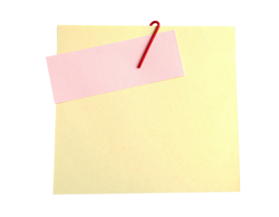 A pale yellow sticky note with a pink rectangle attached by a red paper clip