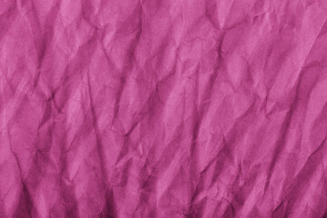 Fototapeta premium Abstract wrinkled pink crumpled paper texture background