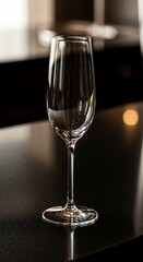 Elegant Champagne Flute on a Dark Surface.