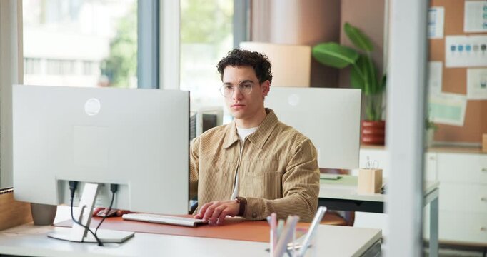 Creative, man and typing on computer at agency for press release, market research and internship. Public relations intern, employee and tech in office for newsletter draft, admin task and media list