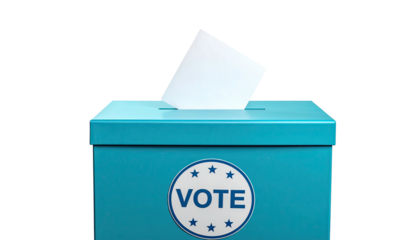 A blue box, a slot receives a white ballot, with a "VOTE" symbol