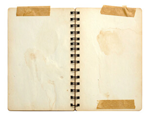 Open spiral notebook with aged, stained pages taped with brown paper, blank