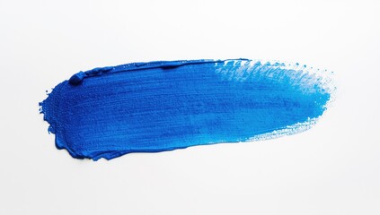Intense vibrant blue paint stroke displayed on a clean white background, forming a textured, brush-like smear, representing creativity and artistic expression.