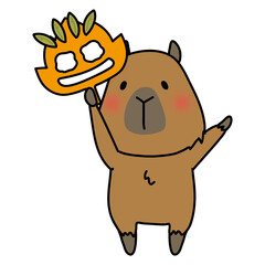 落ち葉のお面を持つカピバラ