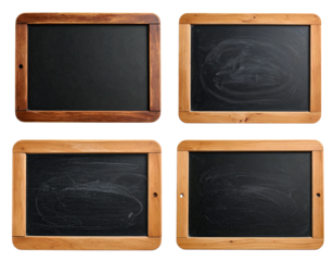 Four vintage chalkboards, some clean, some with chalk marks, with wooden frames