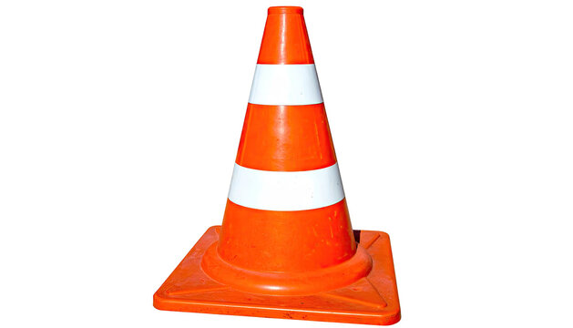 A brightly colored traffic cone with white stripes, isolated on a black background
