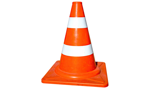 A brightly colored traffic cone with white stripes, isolated on a black background