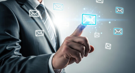 Businessman Taps Email Icon: Modern Communication, Digital Marketing, and Business Technology Concept for Email Marketing and Newsletter Campaigns